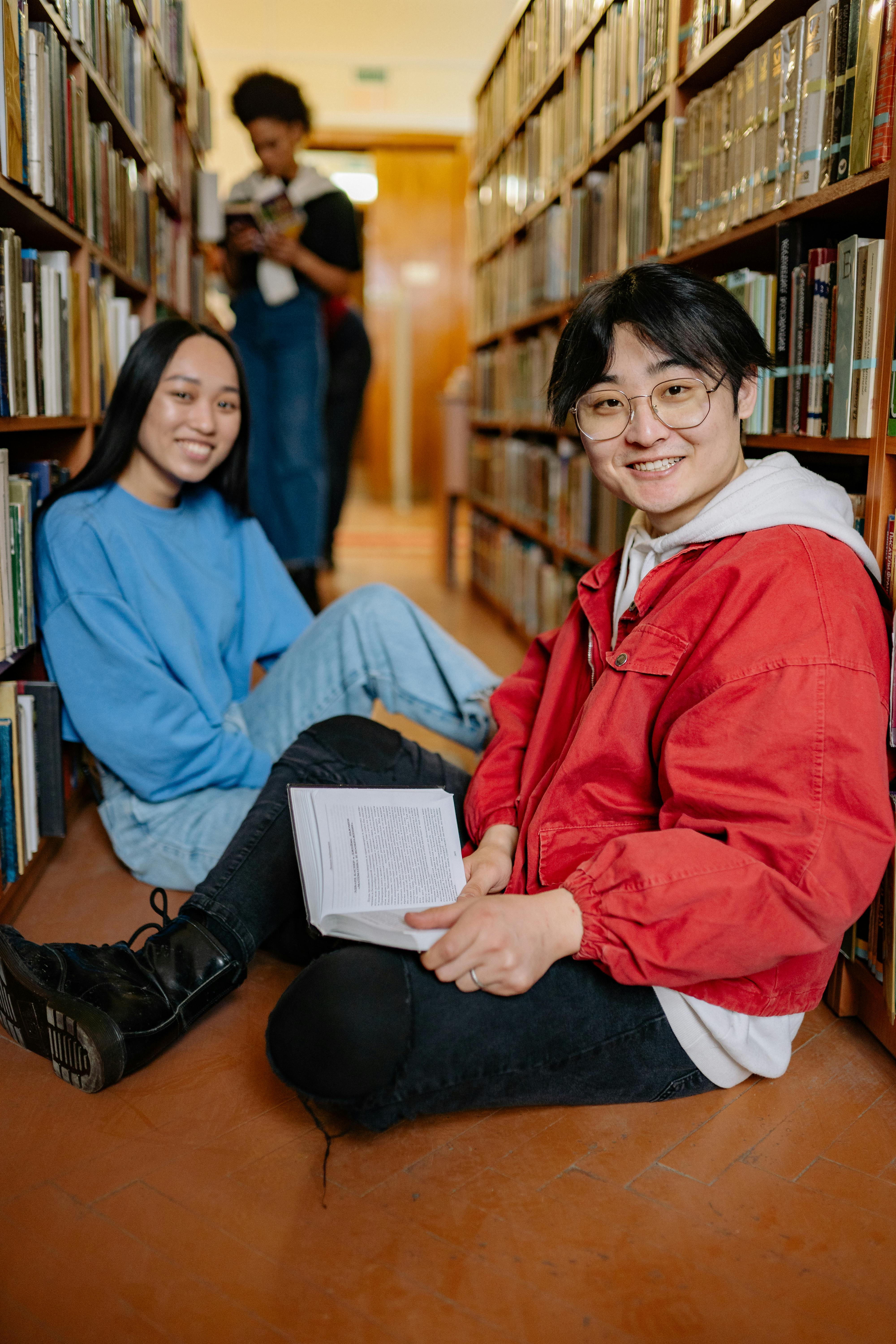 Student reading in library